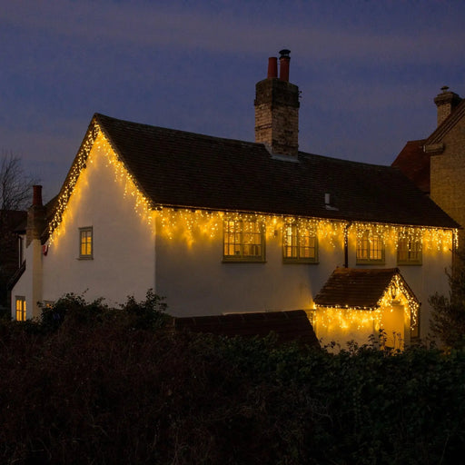 Grade B Warehouse Second - Noma Snowing Icicles : Easytimer : Plug In : White Cable : 144x Warm White LEDs : 3m Noma